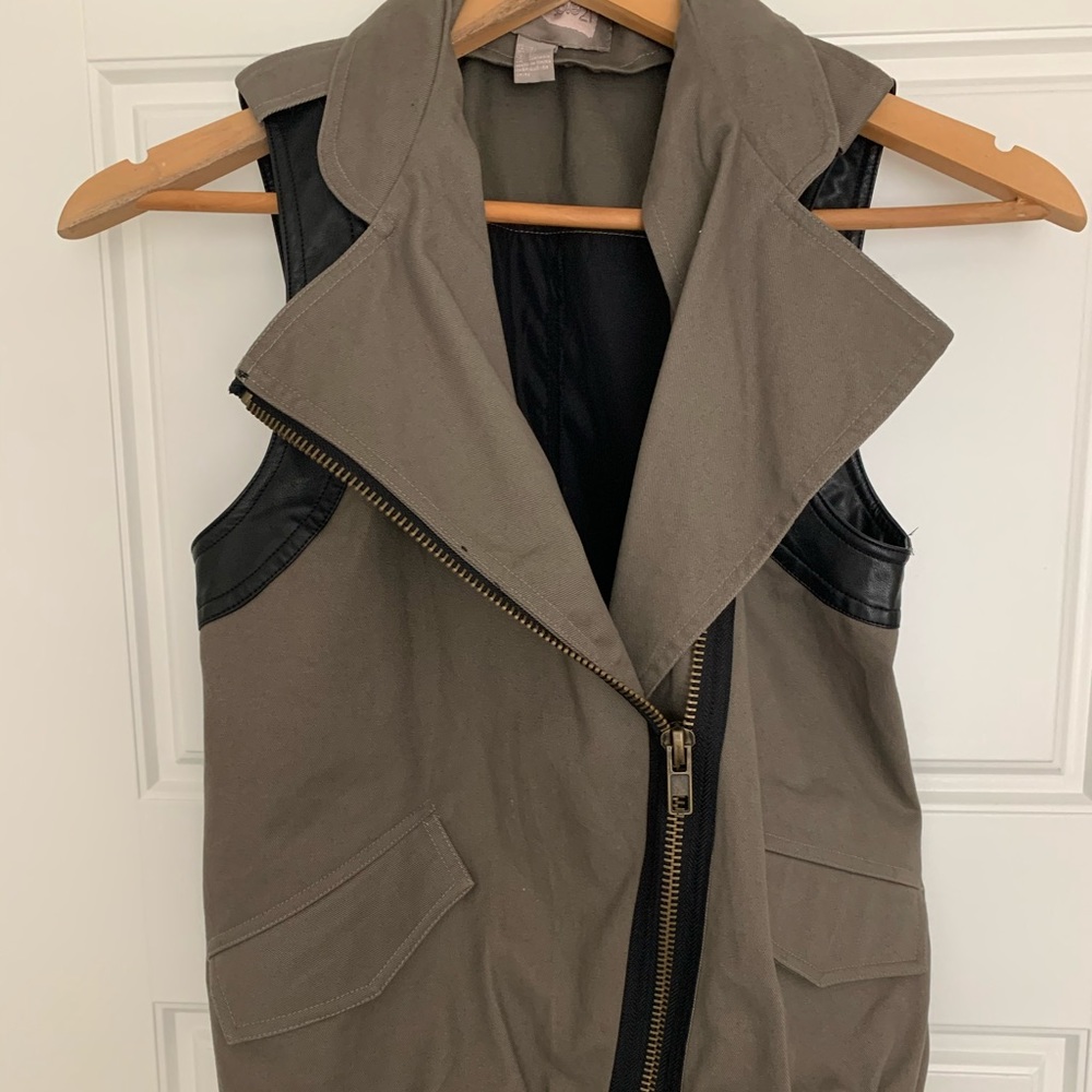 Army vest with leather detailing